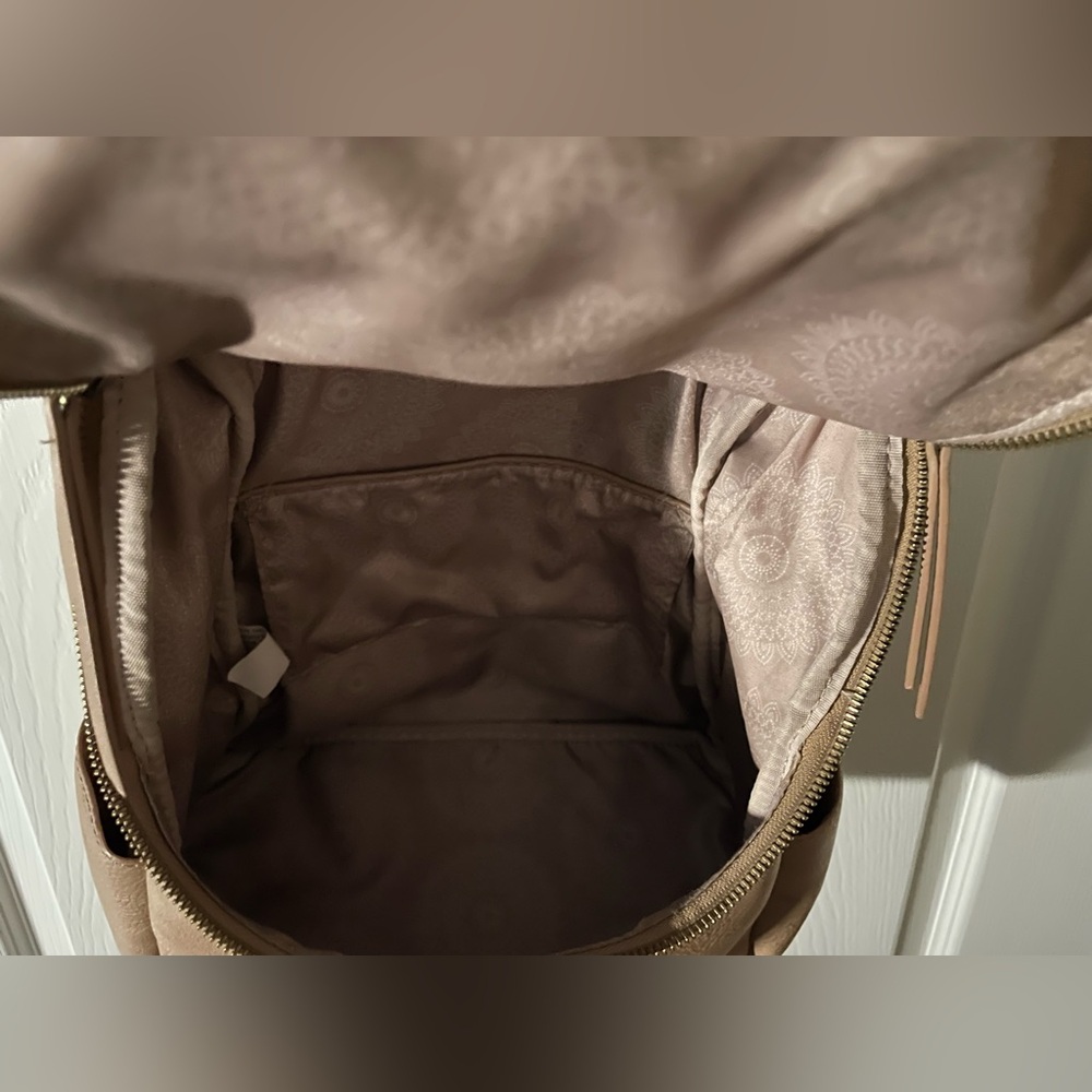 Joy Susan Backpack 
Like NEW !!!
Top 12” W11”D7”Drop 22”
Zip&Slip pockets 
EUC - Picture 4 of 8
